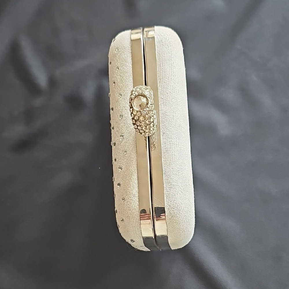 Chic White Clutch with Silver Detailing